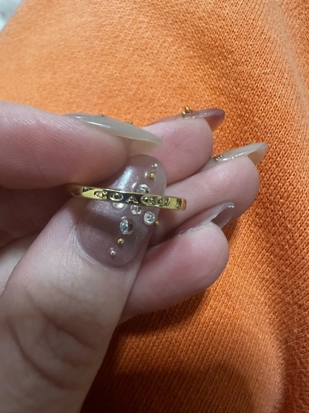 Coach Gold Tone Signature Slim Bangle Ring